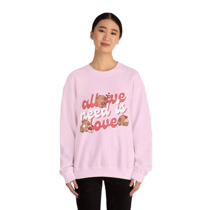 All We Need Is Love Graphic Sweatshirt - Cute Capybara Valentine's Day Sweater for Cozy Comfort Unisex Heavy Blend™ Crewneck Sweatshirt