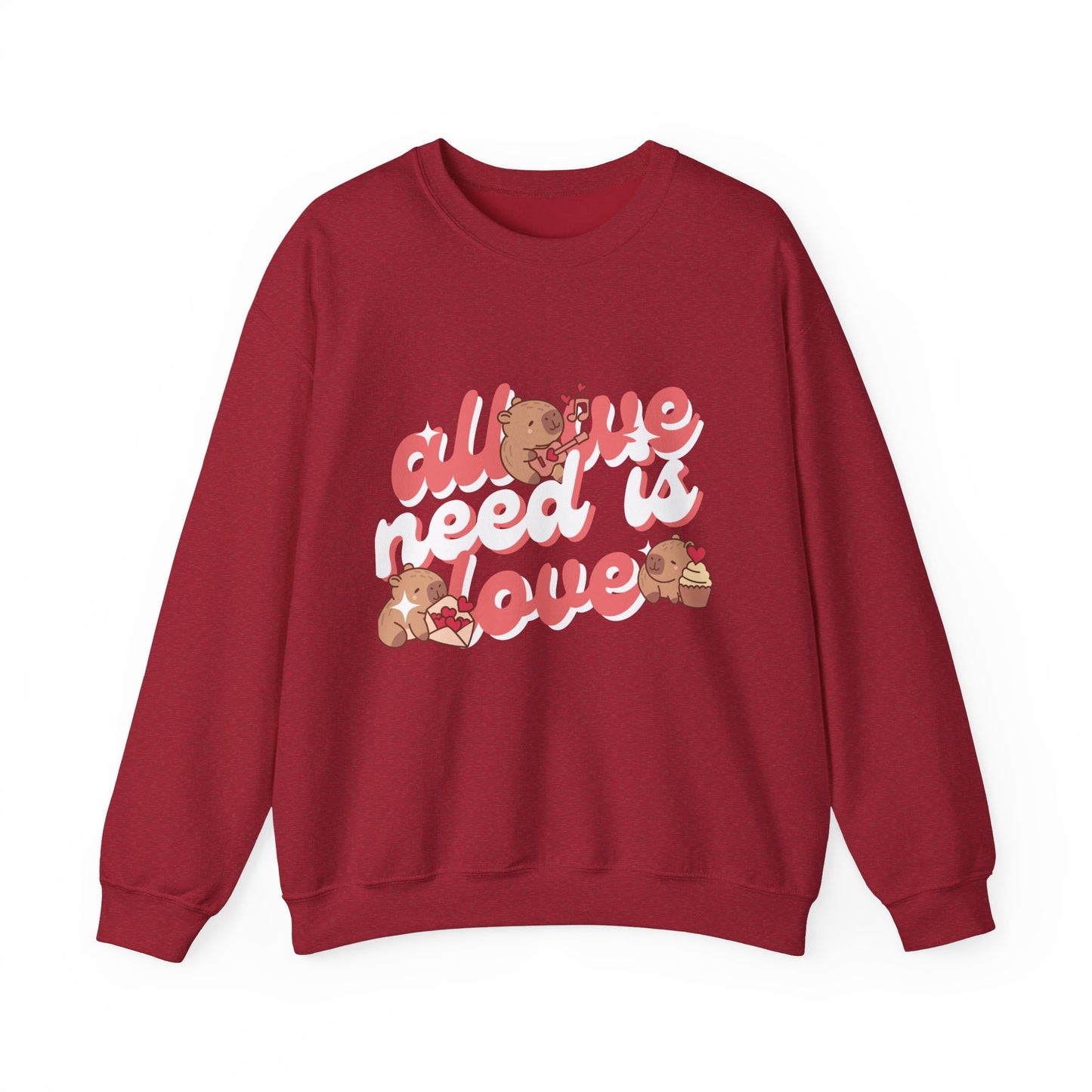 All We Need Is Love Graphic Sweatshirt - Cute Capybara Valentine's Day Sweater for Cozy Comfort Unisex Heavy Blend™ Crewneck Sweatshirt